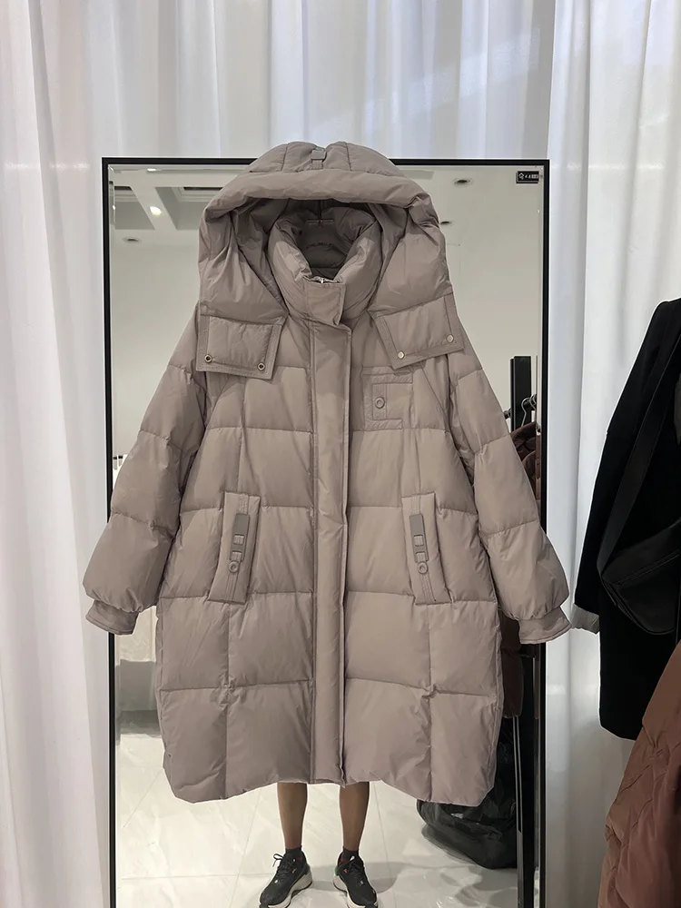 Piumino invernale nuovo da donna medio a lungo edizione coreana felpa con cappuccio alla moda addensata allentata versatile piumino d'anatra bianco