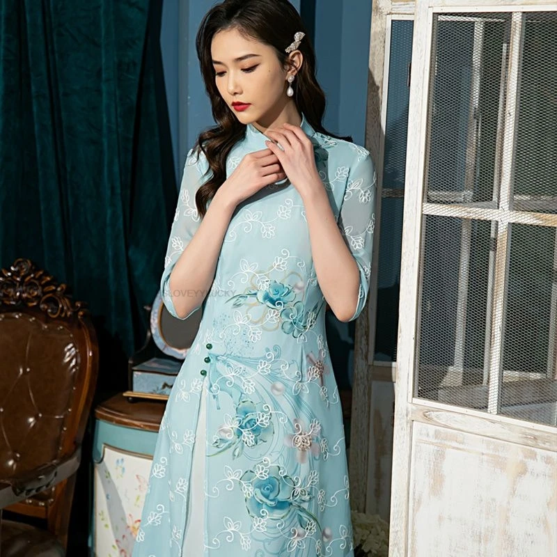 تحسين Aodai Cheongsam فستان المسرح الصيني الأنيق أداء زي المرأة أنيقة المرأة الصينية التطريز فستان تشيباو
