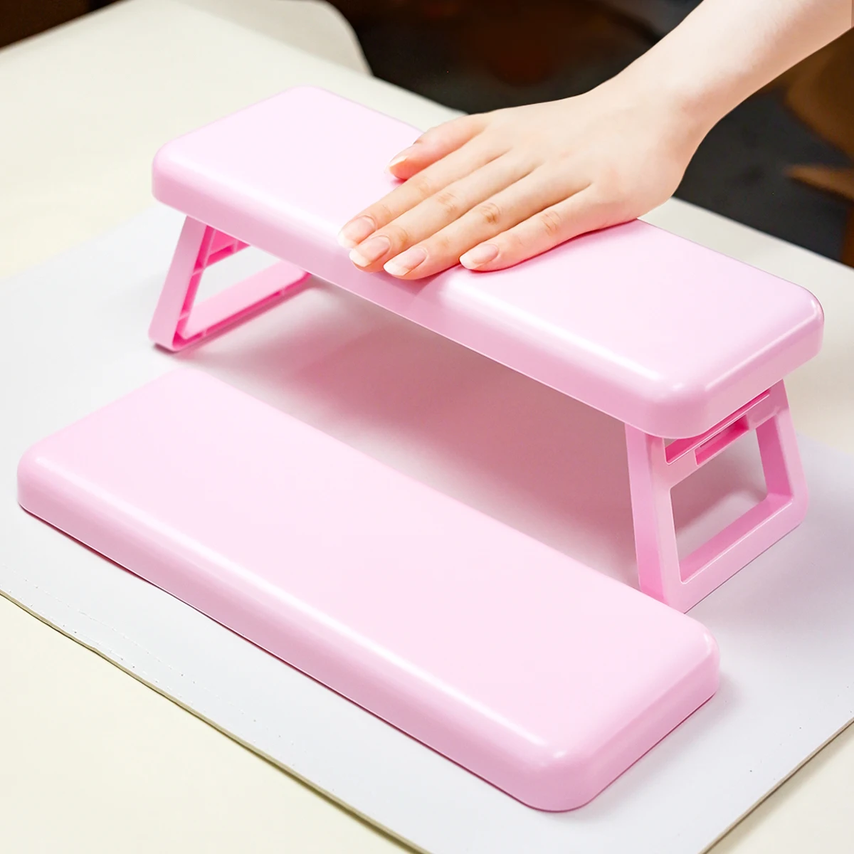 A foldable and height-adjustable nail stand, a comfortable support tool for nail care