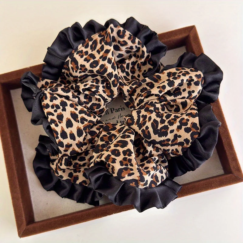 Mode rétro Satin tissu imprimé léopard dentelle intestin anneau de cheveux ins avancé cravate cheveux tempérament bandeau cheveux accessoires