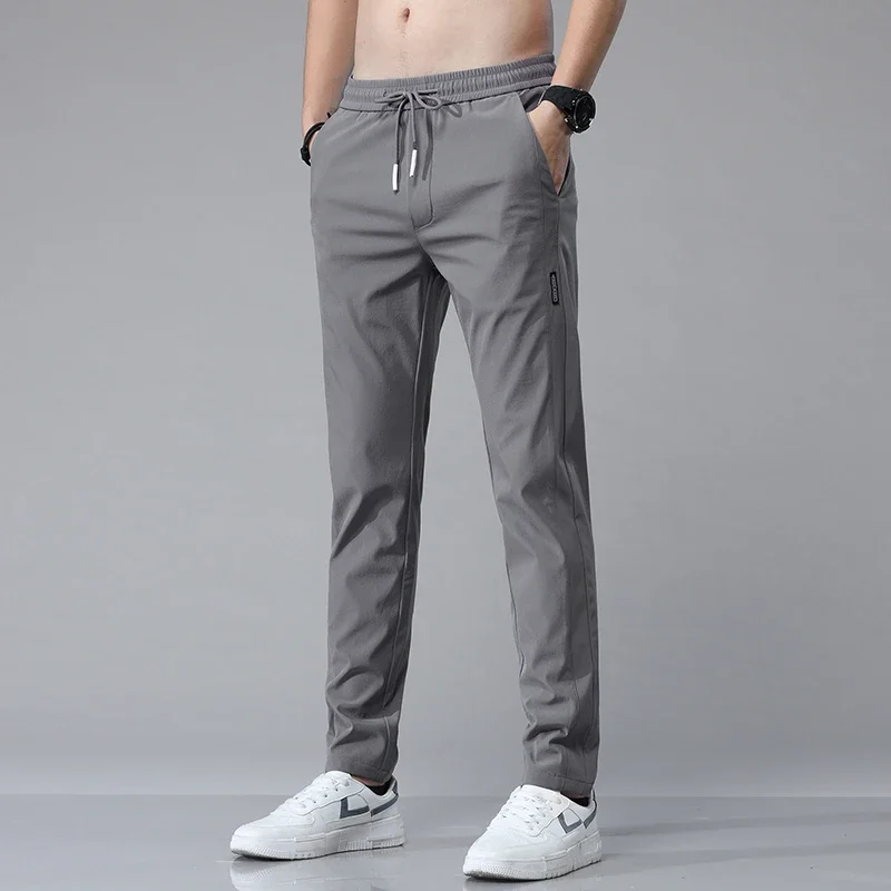

New Mens Summer Autumn Light Thin Sports Wear Tracksuit Pants Men Quick Dry Elastic Sports Pants Trousers Casual Sweatpants