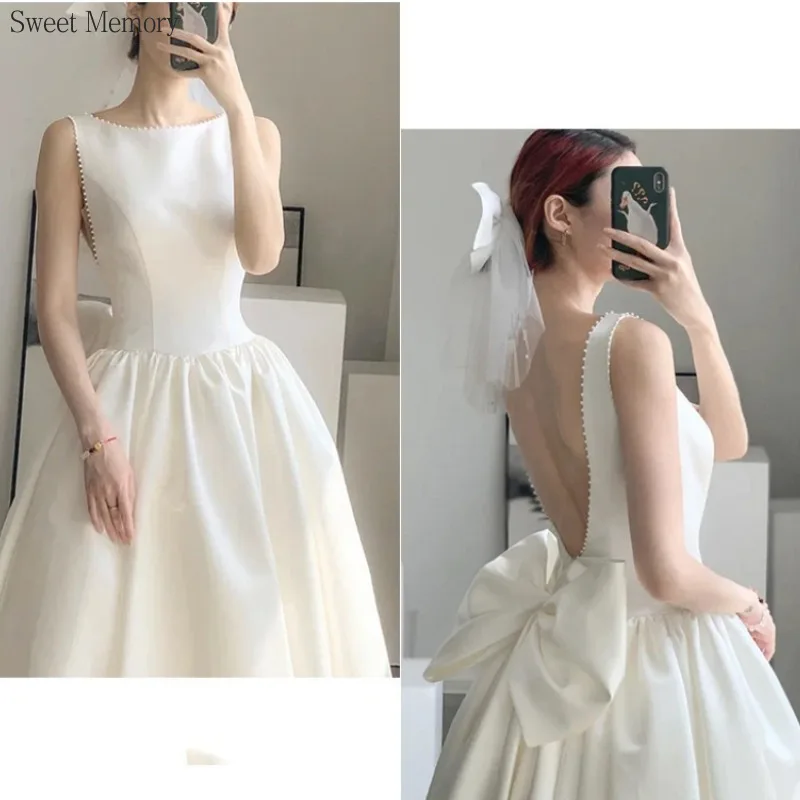 M6118 Customized Luxury White Dress Sweet Memory Princess Robe A-Line O-Neck Sleeveless Satin Backless Wedding Dresses With Bow