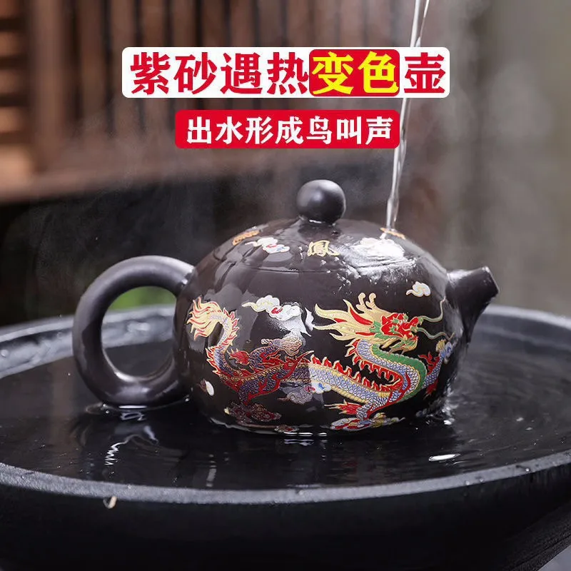 

When exposed to heat, the purple sand color changes, and the dragon and phoenix bring good luck. phoenix crows in teapot