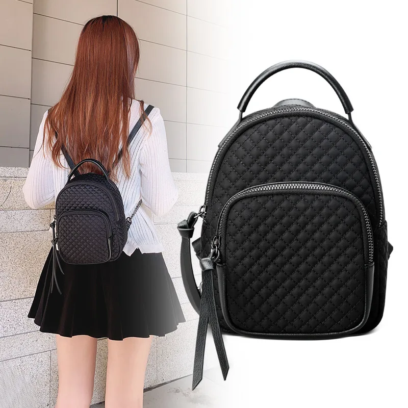 Zaino Casual da donna impermeabile tinta unita borse da scuola di grande capacità borsa da viaggio in Nylon Mochila per donna