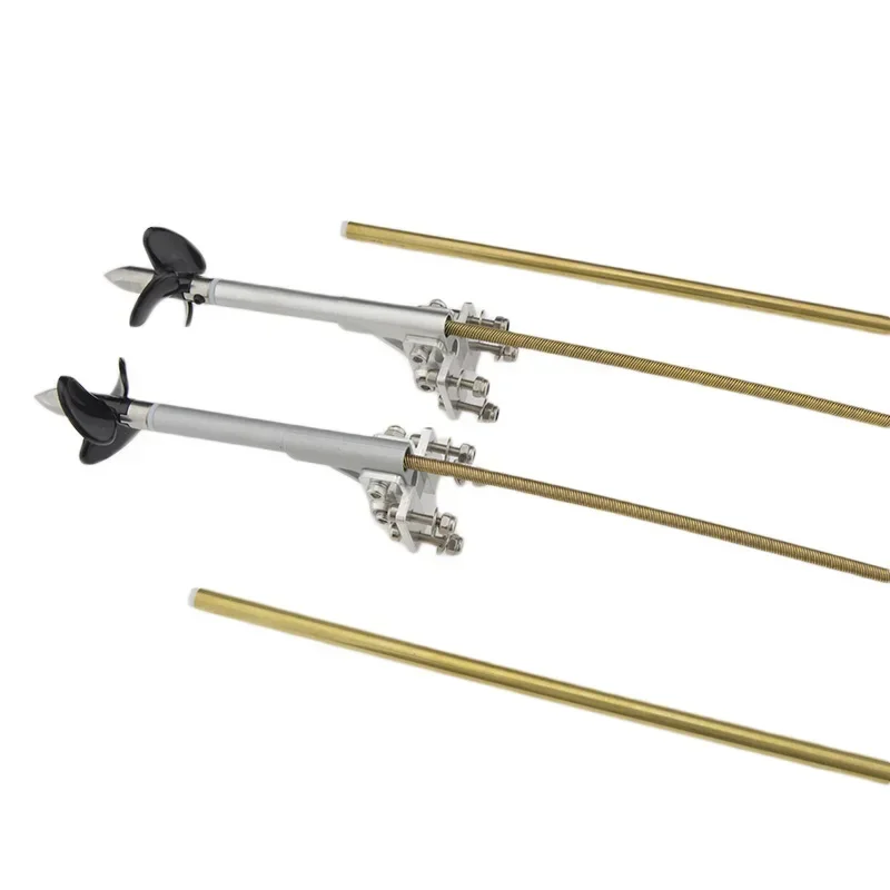 Uniwersalny wałek elastyczny 4mm z przekładnią lewo/prawostronną, nakrętką napędową, plastikową uszczelką, mosiężną rurką i wspornikiem, napęd Stinger do łodzi RC