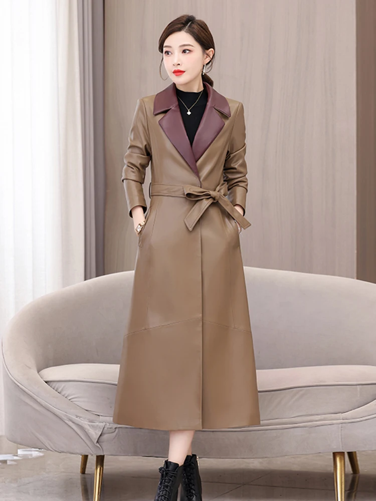 Cappotto da donna in vera pelle di pecora Haining, lunghezza media, con cintura, snellente, autunno inverno, nuovo stile, per pendolari, manica lunga