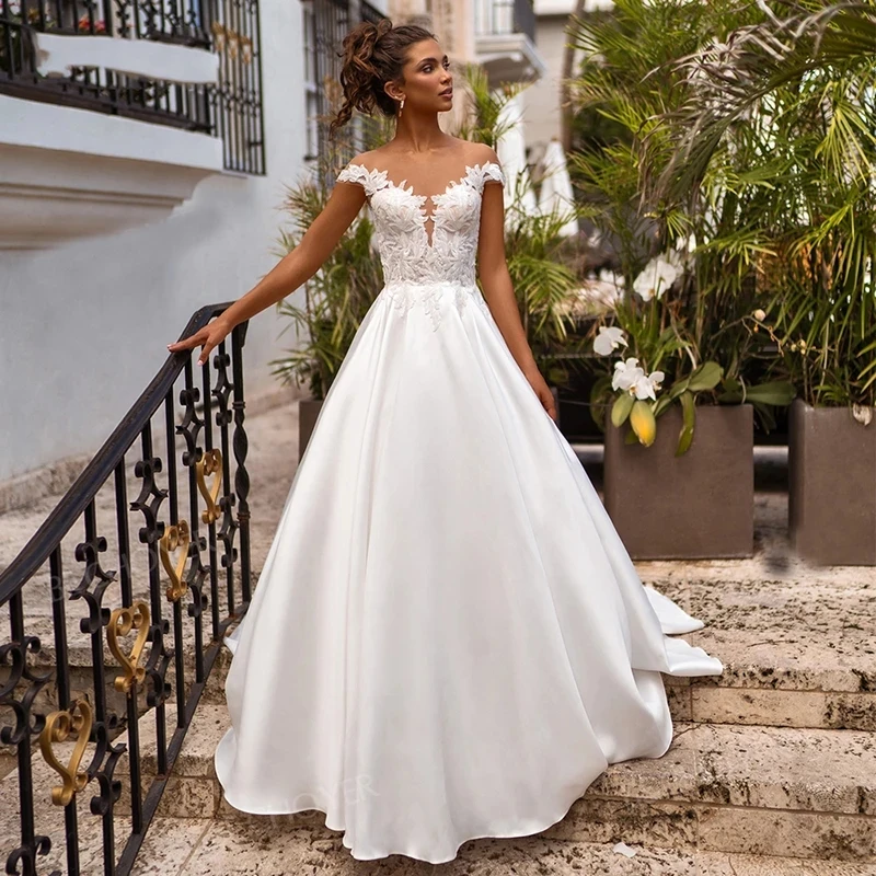 

Boho Wedding Dress 2023 Cap Sleeves Illusion Neck Appliqued Satin Bridal Dress Beach Princess Plus Size Wedding Gowns