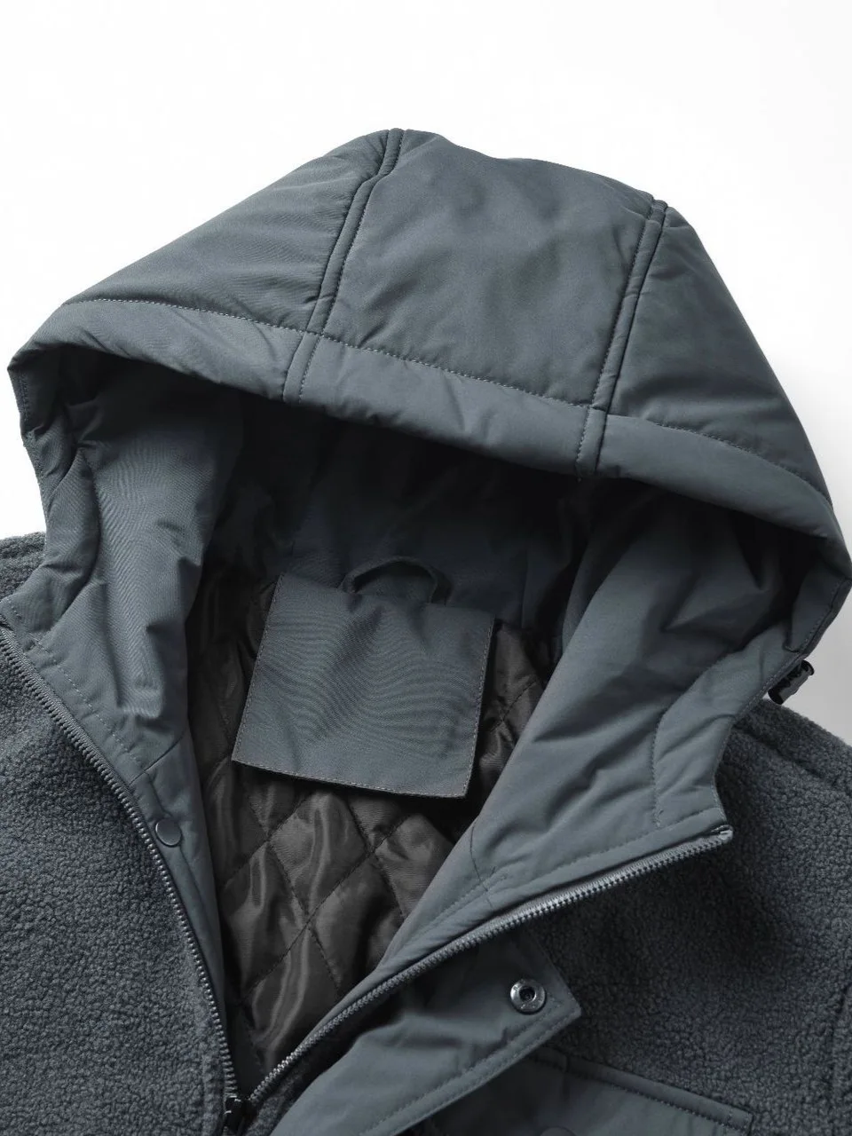 Outono e inverno quente jaqueta espessada para homem, 2025 nova jaqueta casual de retalhos de lã com capuz, casaco superior de inverno