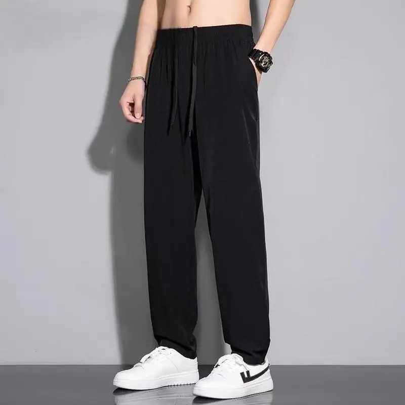 

Men's Black Ice Silk Elastic Waist Wide Leg Pants Loose Straight Leg Casual Lightweight Trousers