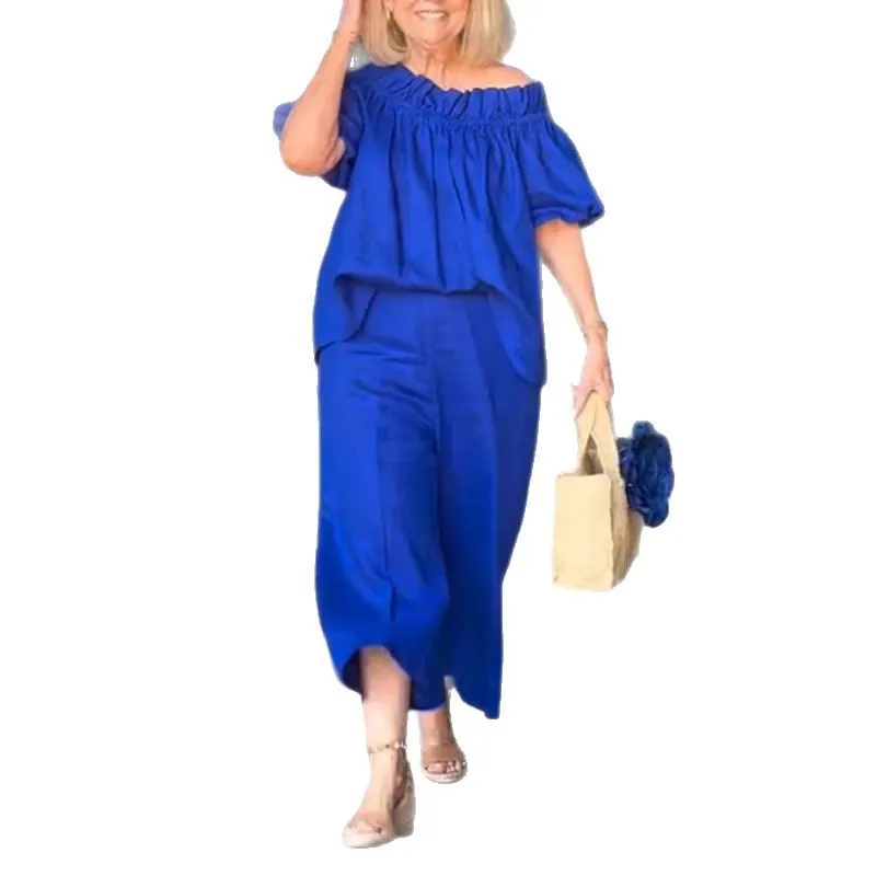 2025 カジュアルワンショルダートップ & ロングパンツスーツ女性エレガント半袖固体ルーズ 2pc セットファッション通勤衣装