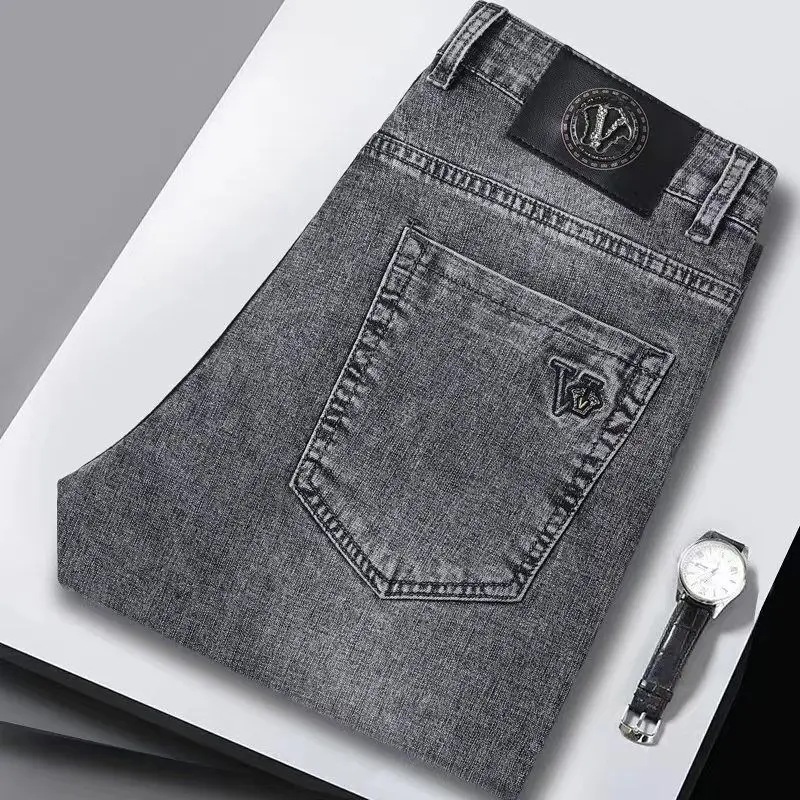 Verão calças de brim finas denim street wear masculino na moda versátil em linha reta elástica calças casuais na moda marca 2025 novas calças lavadas