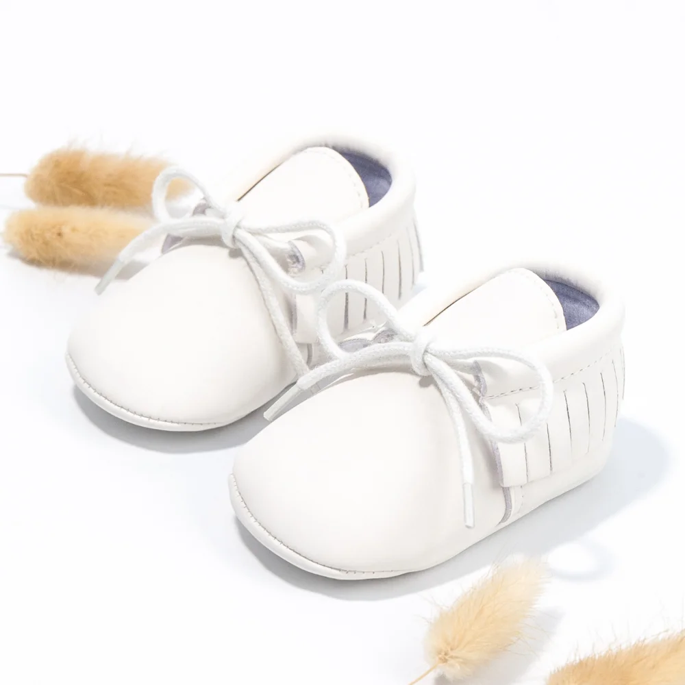الوليد الطفل حذاء كاجوال عالية الجودة لينة الدافئة المضادة للانزلاق الربيع والخريف شرابة جلد أحذية الوليد الأولى ووكر سرير الأحذية