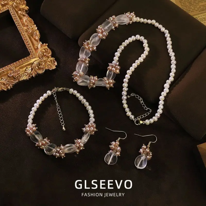 Design: A Set Of Three Jewelry Pieces Featuring A Purple Natural Pearl White Necklace Bracelet And Earrin