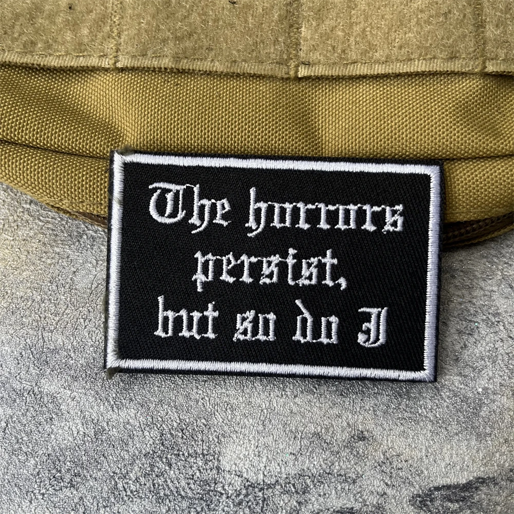 The Horrors Persist, But So Do I Funny Morale Badge Embroidery Hook and Loop Patch Humor Tactical Armband Backpack Sticker