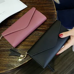 Cartera larga de cuero PU para mujer, monedero de color sólido, Tarjetero con borlas, monedero de mano de alta calidad, novedad