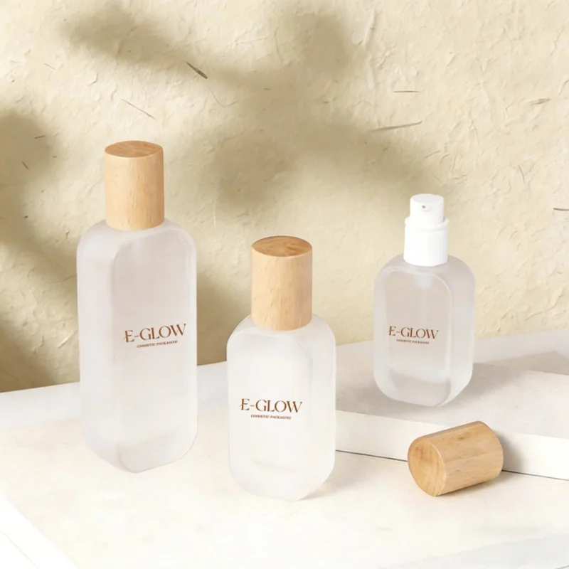 

【Нанесение логотипа】1 шт. Новая модель: плоская прямоугольная матовая косметическая бутылка с помпой, 100 мл, стеклянная бутылка, баночка для крема с деревянной крышкой, 50 г.