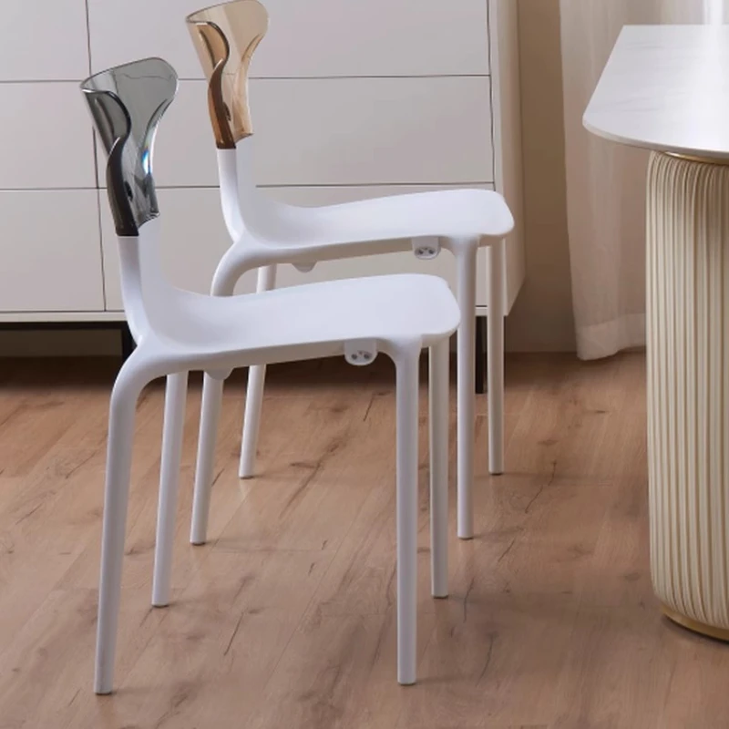 

Nordic cafe transparent dining chair designer splicing color chair Internet celebrity special-shaped stackable