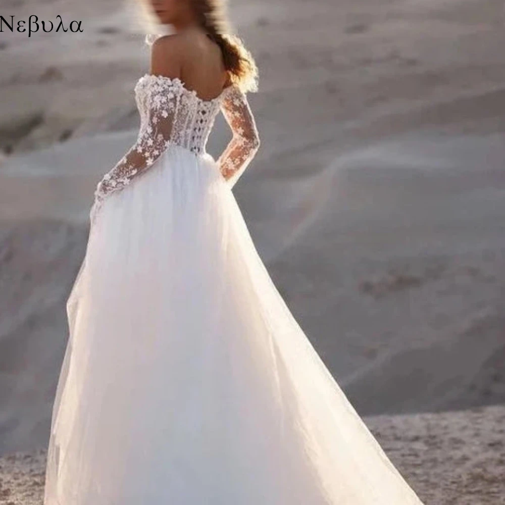 فستان زفاف رسمي أنيق ورائع وفاخر حالم مزين بالتول الأبيض لحفلات الزفاف بدون أكمام