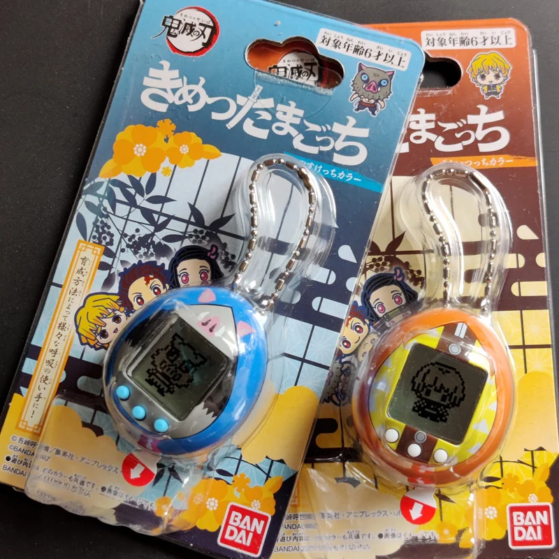 Nuovo arrivo Bandai Demon Slayer Tamagotchi Egg Machine Model Toys Kimetsu Retro Vintage Game Console Kid Toy Play regali di compleanno