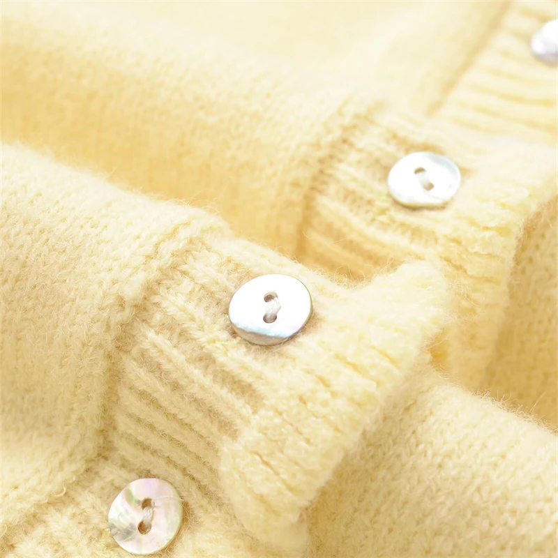 KEYANKETIAN Wiosna/Jesień Nowe damskie Agaric Dekoracja Dzianinowe swetry rozpinane Podstawy Jednolity kolor O-Neck Z długim rękawem Wąski sweter Top