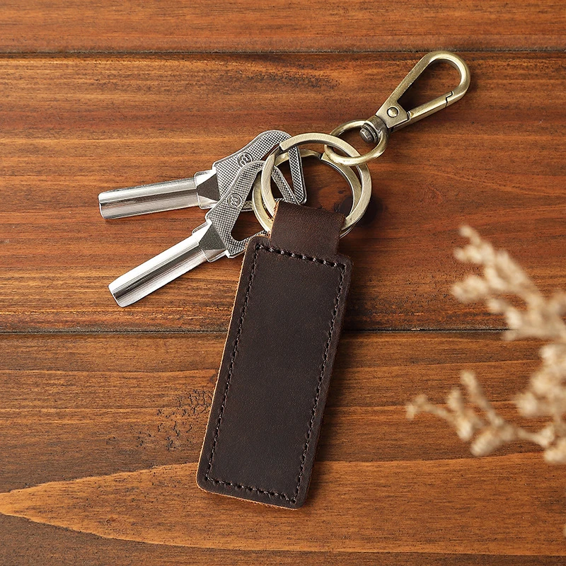 Porte-clés rétro en cuir véritable et cuir de vachette, porte-clés de voiture anti-perte personnalisé, pendentif fermoir ster corrigé en métal, mode