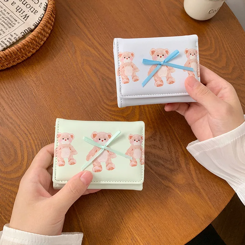 Portefeuille court en forme d'arc pour femmes, portefeuille porte-cartes à changement ample multifonctionnel à trois volets pour étudiantes, dessin animé et mignon