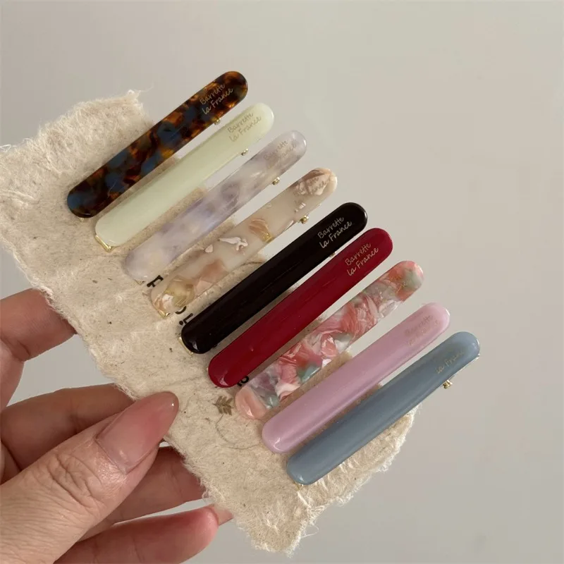 Korean version of the gold label cute little baguette one-word clip French acetic acid texture solid color side bangs clip