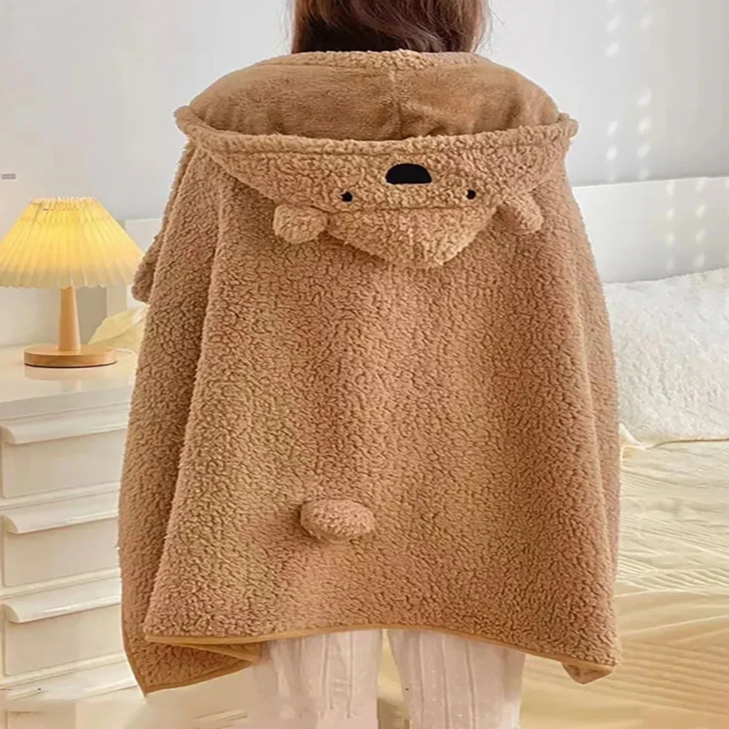 

Stay warm and cozy this winter with the incredibly soft and plush Winter Bear hooded fleece blanket. Indulge in ultimate comfort