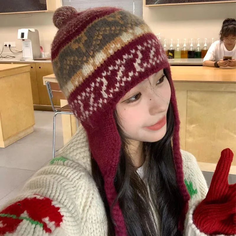 Japoński Retro żakardowy niszowy sweter z mieszanki wełny latający kapelusz unisex zimowy ciepły ochraniacz na uszy dzianinowe koronkowe czapki bomberki Gorras
