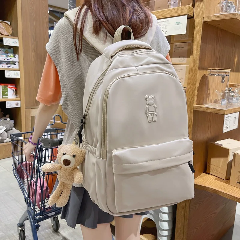 

Shoulder bag girls students fashion large capacity backpack high school travel shoulder bag small bear pendant seasons