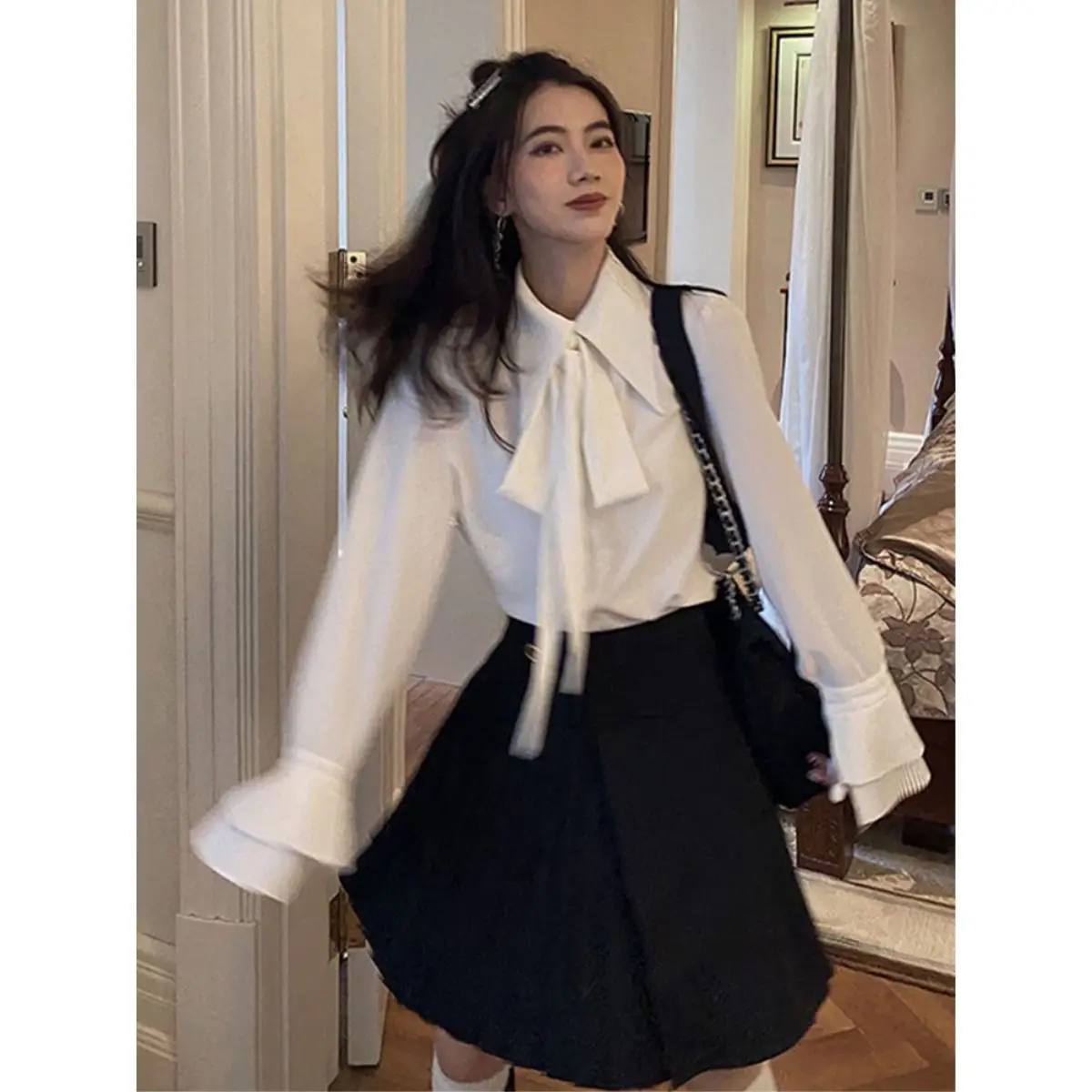 

Ранняя весна 2025 года, французская милая и шикарная верхняя конструкция, нишевая многослойная розовая рубашка с внутренним слоем