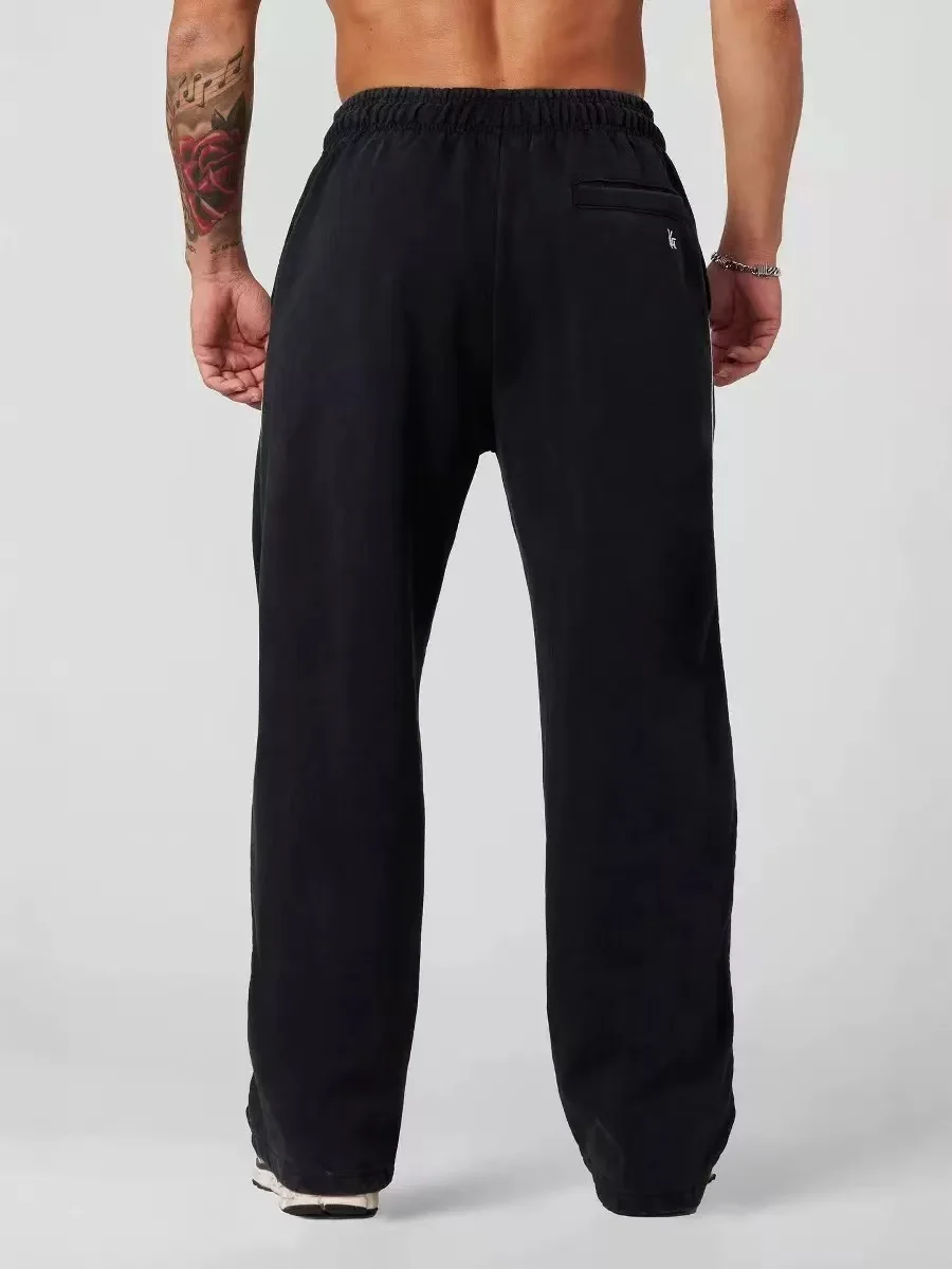 بنطال رياضي رجالي من القطن مقاس كبير لربيع الخريف بلون سادة فضفاض بخصر مطاطي كاجوال للارتداء اليومي والجري