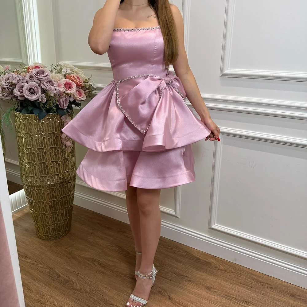 カスタマイズされた A ラインウエディングドレス膝丈スパゲッティストラップノースリーブファッションクリスタルリボンシンプルなドレープバックレスパーティードレス