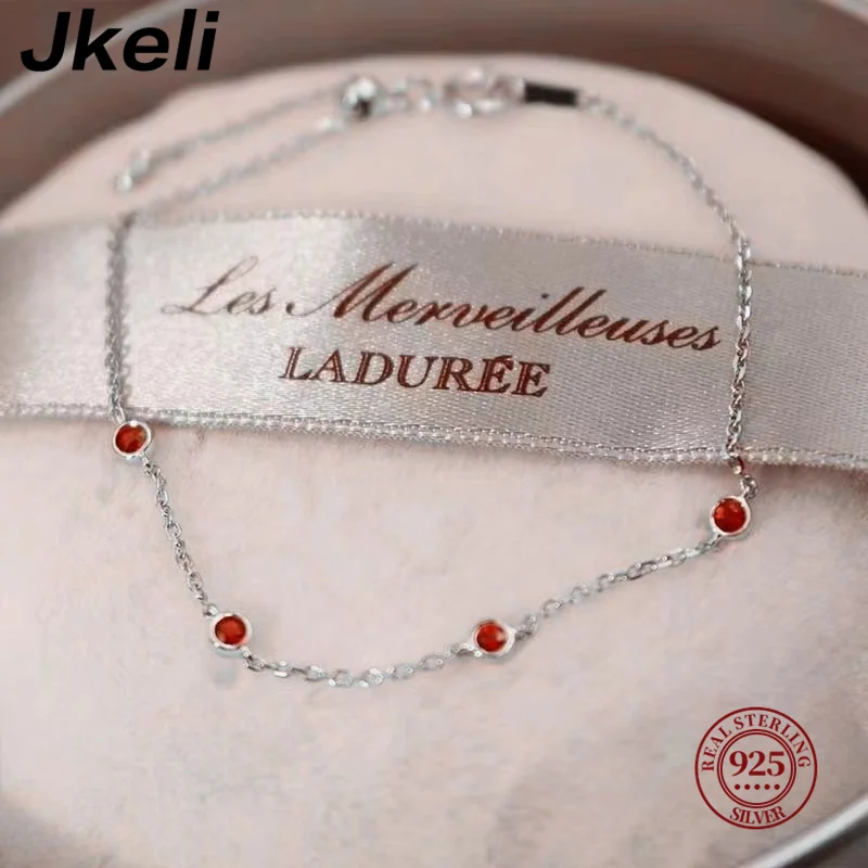 Imagen 4: Jkeli-Mini pulsera de plata de ley 925 para mujer, brazalete de cadena exquisita de lujo, cuatro redondos, rubí, circón, nicho de moda