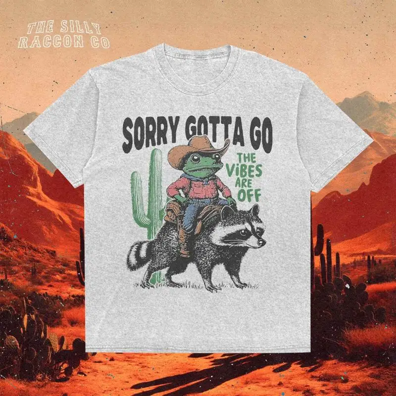 

Футболка с изображением ковбойской лягушки и енота Äì Funny Western Meme The Vibes Are Off Top