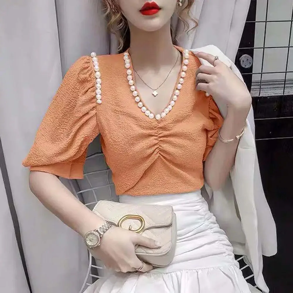 2024 Summer New French Chiffon Shirt Ladies Sweet Pearl V-neck Design Slim Bubble Short Sleeve Blouses for Women Solid Color Top