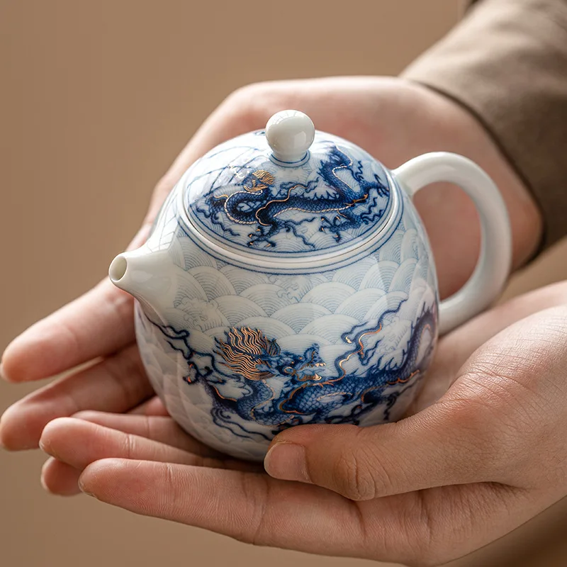 

Gold and Silver Inlaid Blue and White Dragon-patterned Teapot Round Egg-shaped Teapot Single Ceramic Tea Infuser Tea Kettle