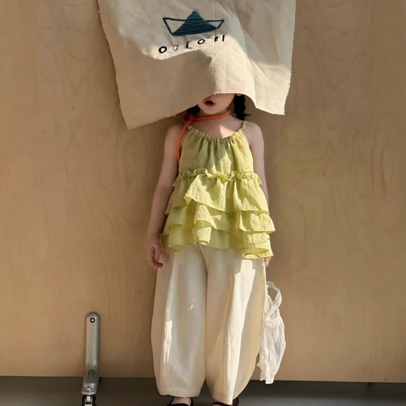 

Girls Suit2026New summer outfit: a ruffled edge camisole paired with striped anti-mosquito wide-leg pants