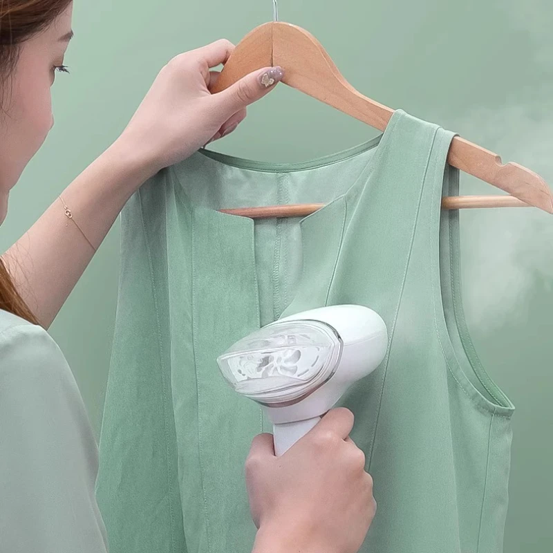 เตารีดไอน้ำแบบมือถือและเตารีดไอน้ำแบบพกพา ใช้ในหอพักหรือการเดินทาง ไอน้ำกำลังสูง ดีไซน์พับได้ กำจัดรอยยับได้อย่างรวดเร็ว