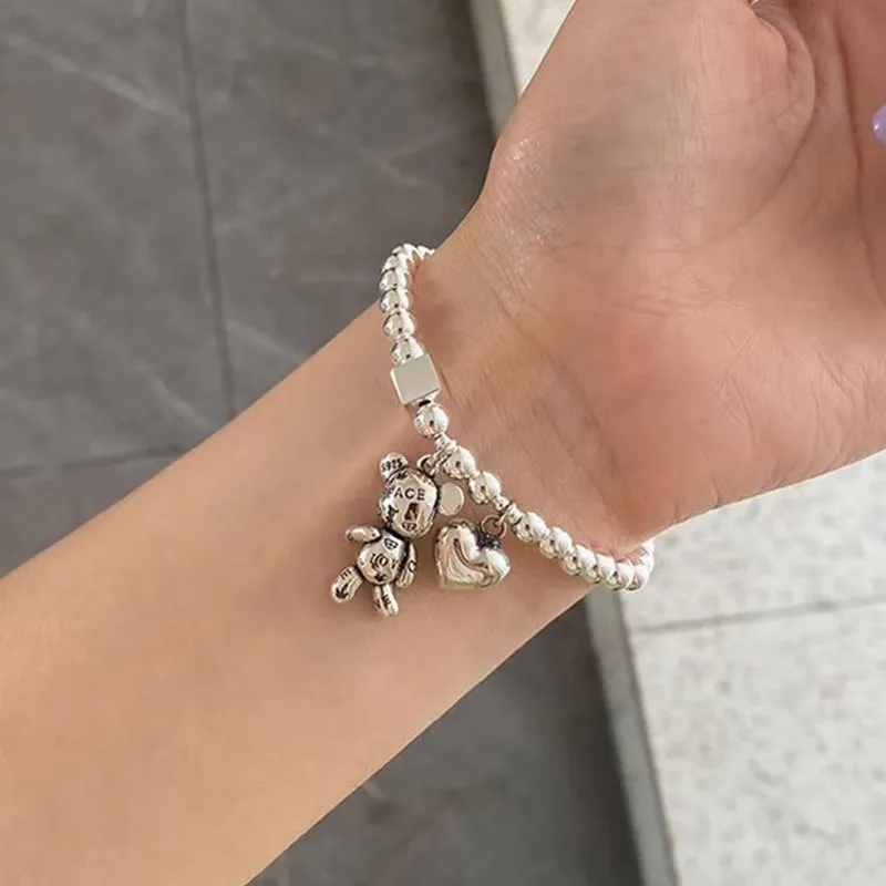 

QMCOCO Silver Color Punk Bracelets For Women String Beads Accessories Trend Vintage Simple Cute Bear Pendant Party Jewelry
