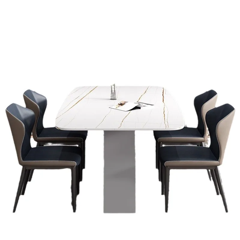 

Italian light luxury rock slab dining table and chair combination, small household rectangular dining table