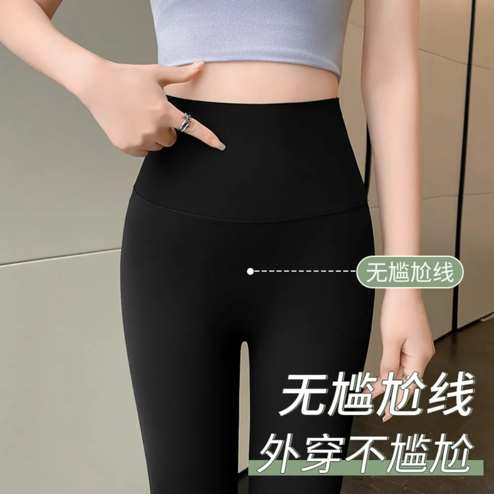 2025 Capispalla primaverile ed estivo Maglia di pelle di ghiaccio Pantaloni sottili di squalo a nove punti Leggings per protezione solare per yoga per il sollevamento dell'addome e del sedere