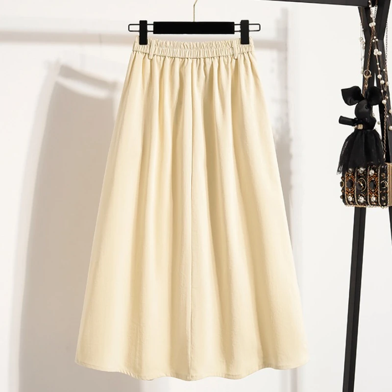 صيف 2025 جديد ارتفاع الخصر غير النظامية منتصف تنورة طويلة المرأة حجم كبير تنورة امرأة مرونة الخصر ألف خط مطوي التنانير حجم كبير