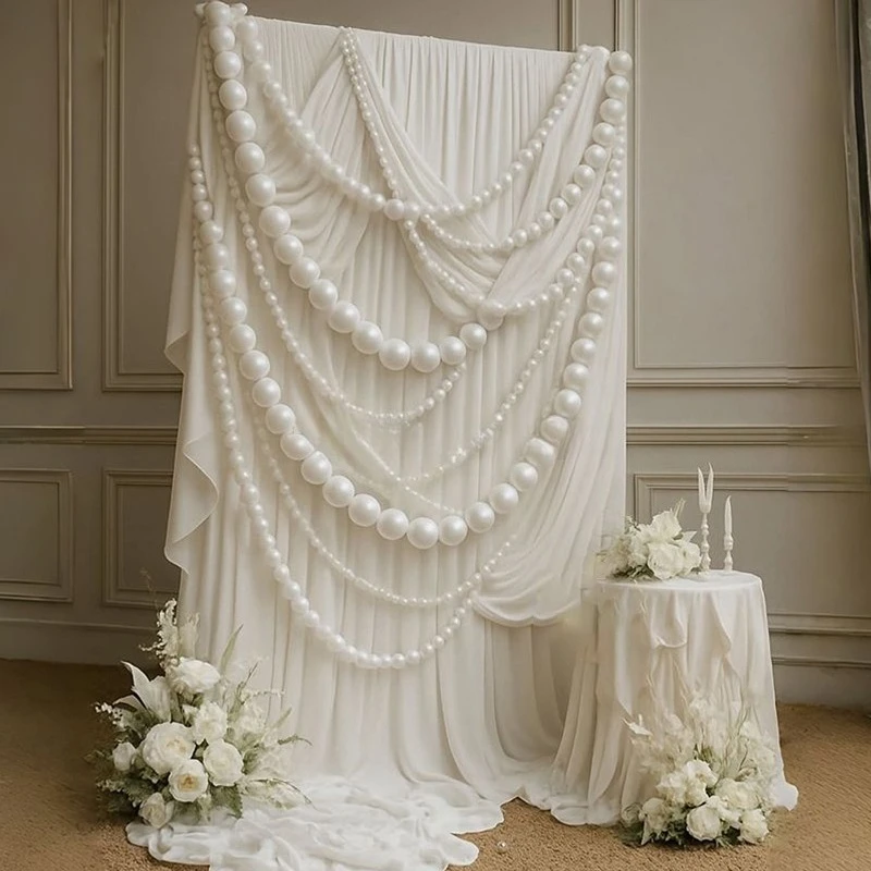 Romantic wedding background decoration hanging white pearl wreath giant bow foam pearl string curtain