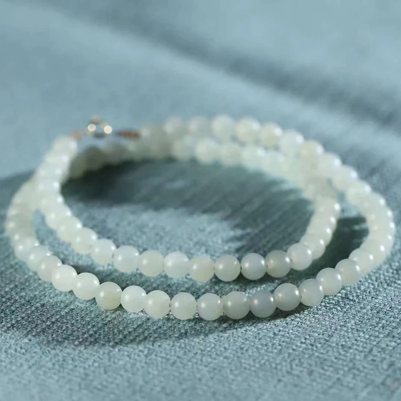 

Набор из ожерелья и браслета Natural Hotan, изготовленный из старинного синего материала Qemuo и зелено-белого нефрита.