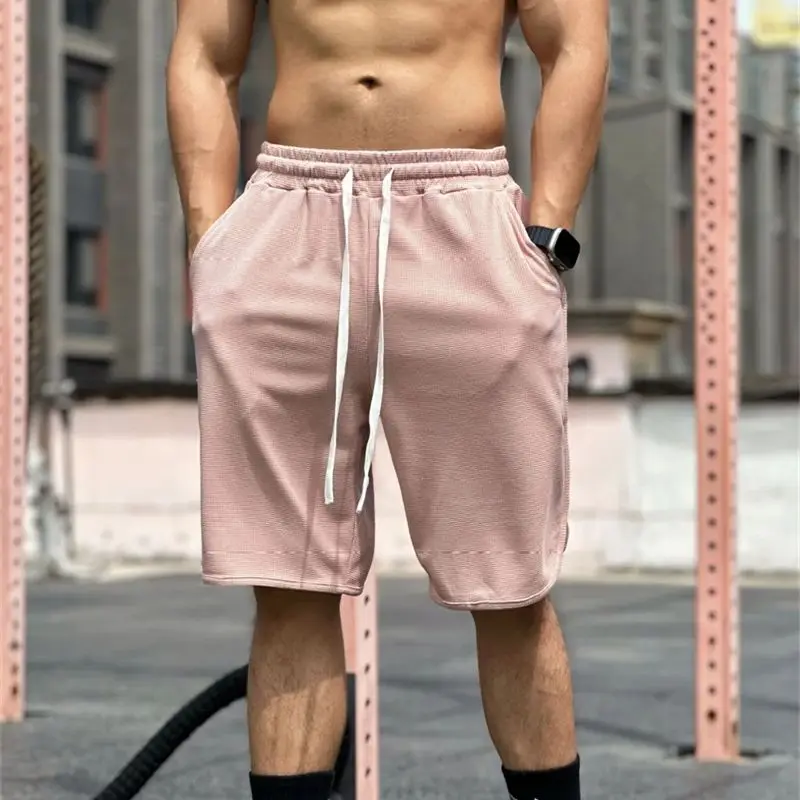 New men's casual pants Summer outdoor men's shorts Fashion solid color five quarter pants quick dry loose fitness pants