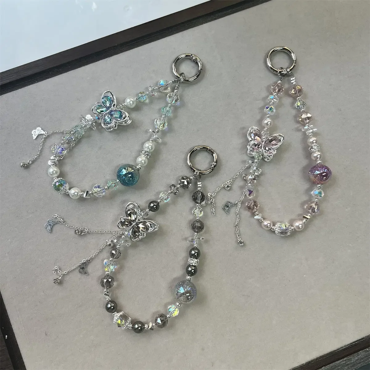 

Luxury Glitter Diamond Butterfly Tassel Bead Phone Bracelet Strap Charm Chain Knot Cellphone Lanyard Bag Camera Keychain Gift