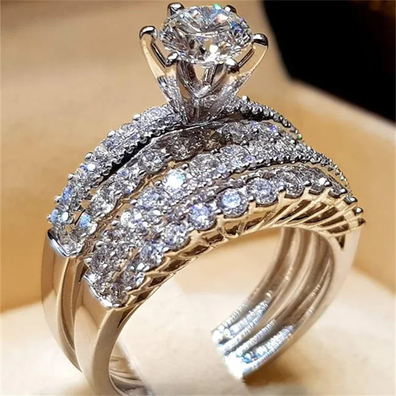 خواتم فاخرة فضية اللون معدنية من الحجر الأبيض مجموعة خواتم زفاف خطوبة عصرية رائعة للنساء مجوهرات