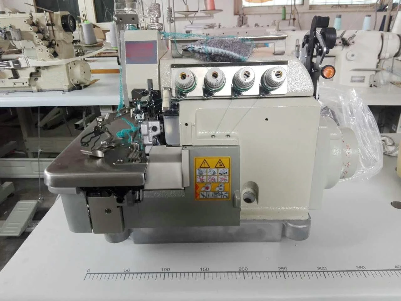 Sewing machine 988T-4D direct drive differential up and down feeding four-thread overlock sewing machine, edge locking machine