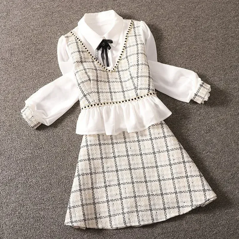 

Pop French College Fashion Plaid BlackBowKnot Leisure Stitching Top Women's Spring And Autumn New Fashion Short Skirt Two-piece